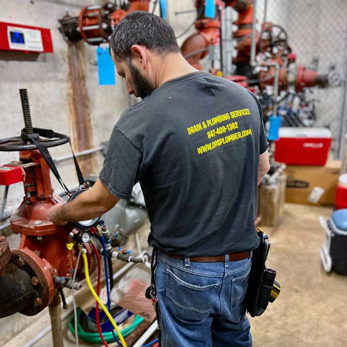 A Local Plumber RPZ Backflow Inspection Expert Near Vernon Hills IL A local DPS Plumber near Vernon Hills performing rpz backflow testing