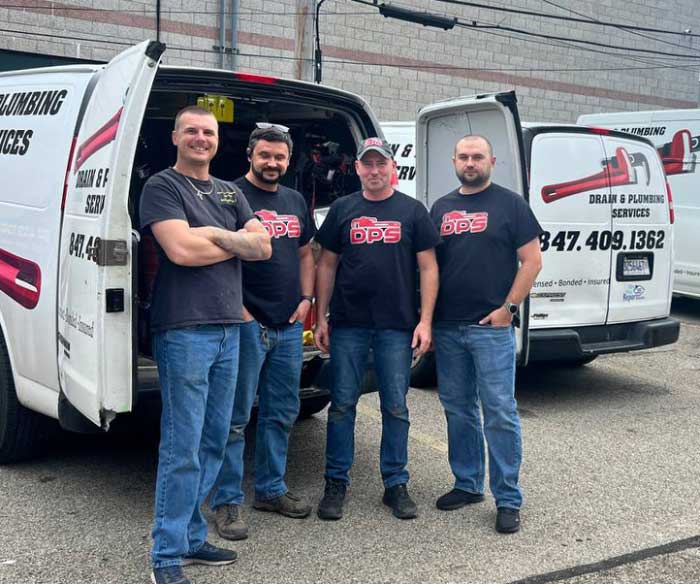 Team Of DPS Plumbers Near Arlington Heights Our local team of DPS plumbers near Arlington Heights standing by the work truck, smiling and ready for action