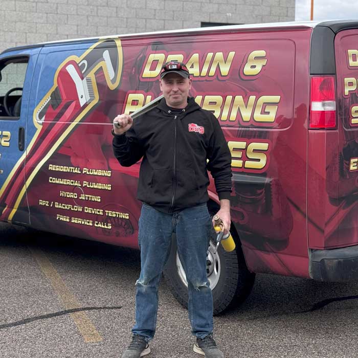 A Local DPS Plumber Near Schaumburg A local DPS plumber near Schaumburg standing by the work truck and is ready for action